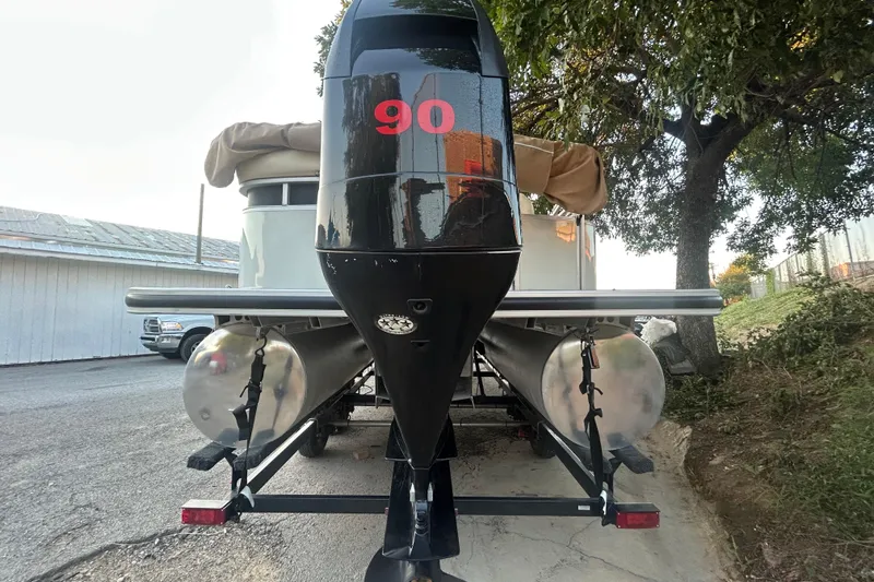 Slide: The Image of 2011 SUNTRACKER PARTY BARGE 22 REGENCY EDITION pontoon boat on trailer, side view. - 6