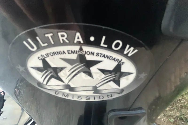 Slide: The Image of 2011 SUNTRACKER PARTY BARGE 22 REGENCY EDITION with 90 HP engine, parked outdoors. - 7