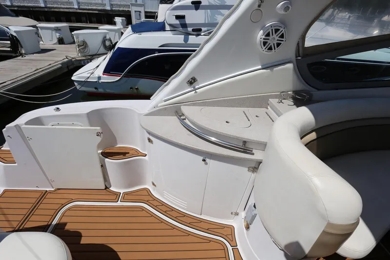 Slide: The Image of 2005 Four Winns 348 Vista yacht interior with seating and wood flooring. - 19