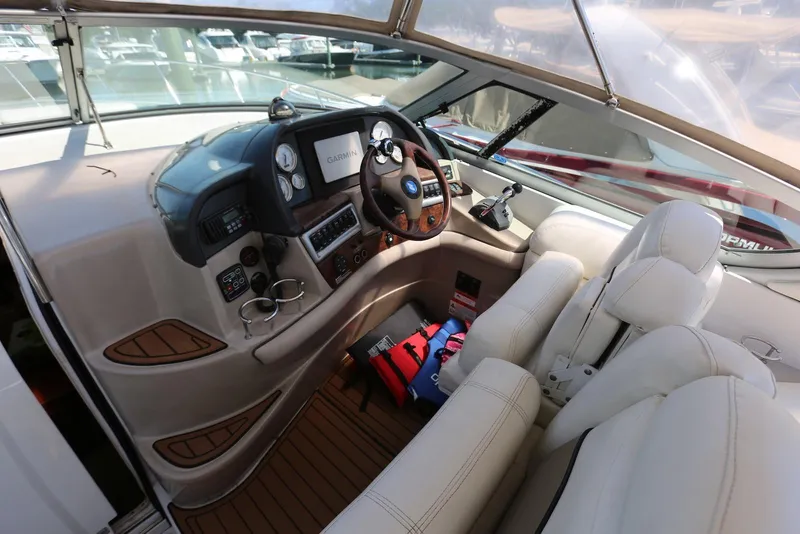 Slide: The Image of Interior cockpit of 2005 Four Winns 348 Vista boat with Garmin navigation system. - 27