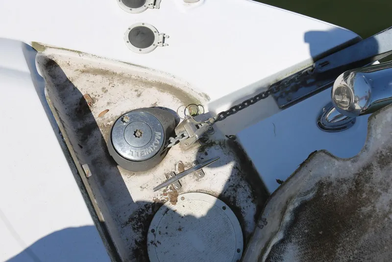 Slide: The Image of Anchor chain and winch on 2005 Four Winns 348 Vista boat deck. - 56