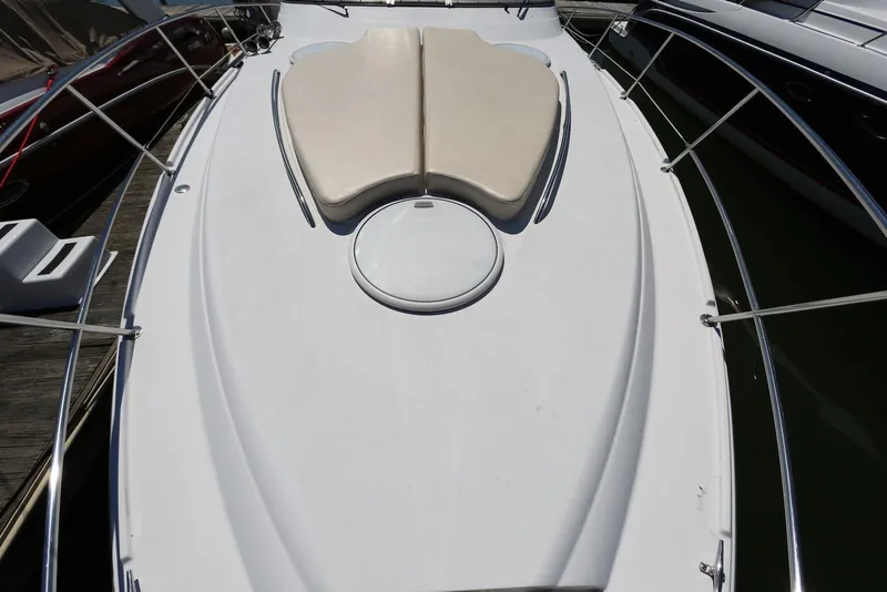 Slide: The Image of 2005 Four Winns 348 Vista boat deck with sunpad and railing. - 9
