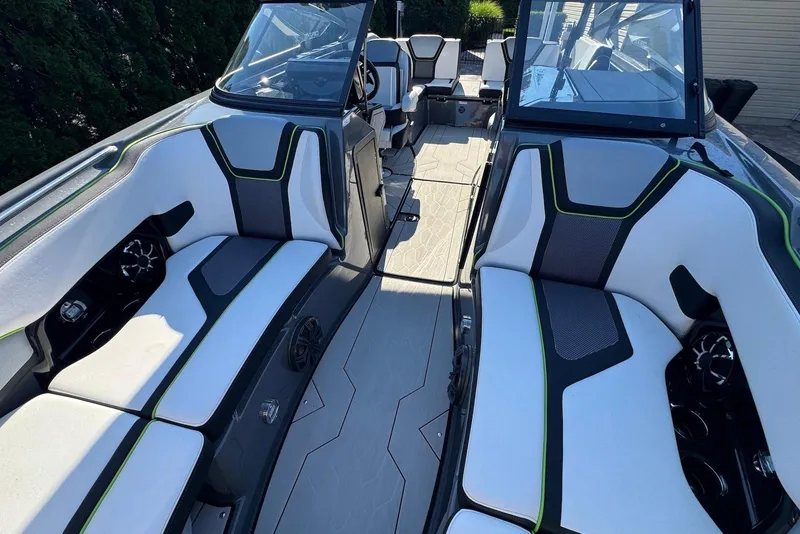 Slide: The Image of 2021 Yamaha Boats 255XD interior with sleek seating and modern design. - 10