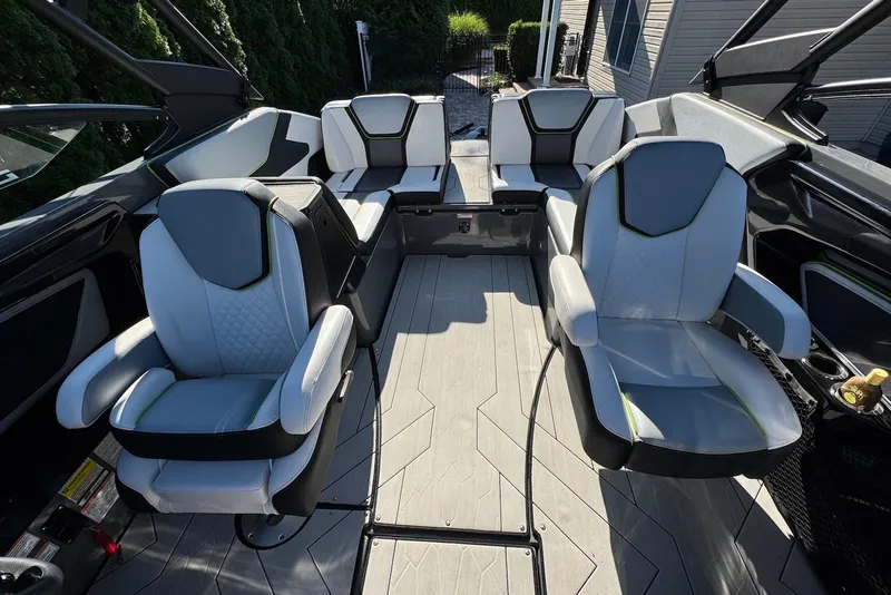 Slide: The Image of 2021 Yamaha Boats 255XD interior with modern seating and sleek design. - 13