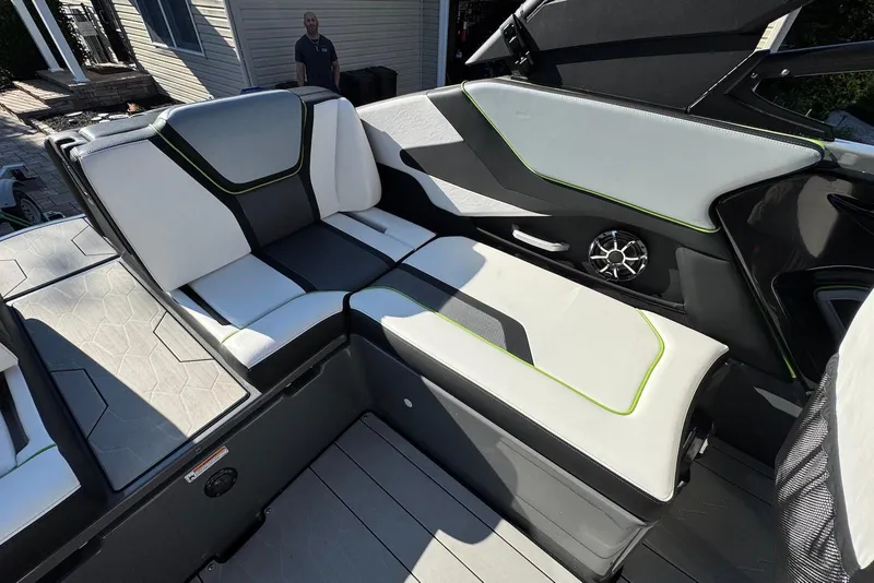 Slide: The Image of 2021 Yamaha Boats 255XD interior with stylish seating and modern design. - 16