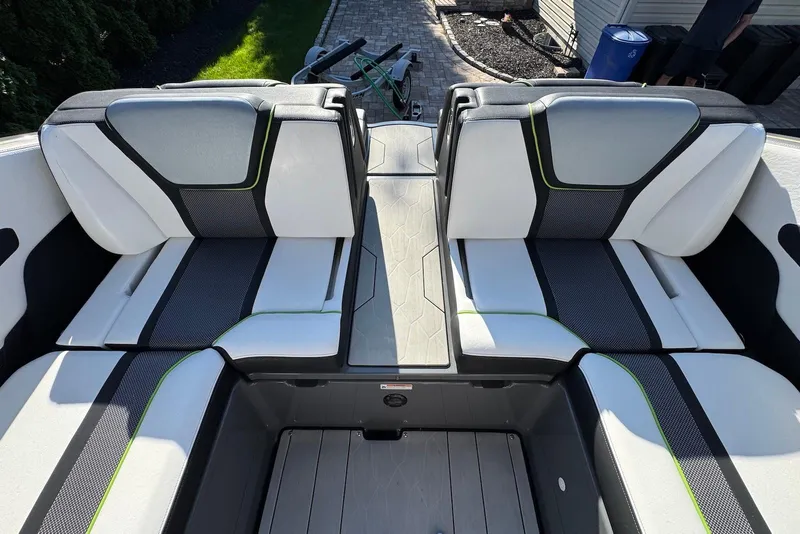 Slide: The Image of 2021 Yamaha Boats 255XD interior seating with modern design and contrasting colors. - 18
