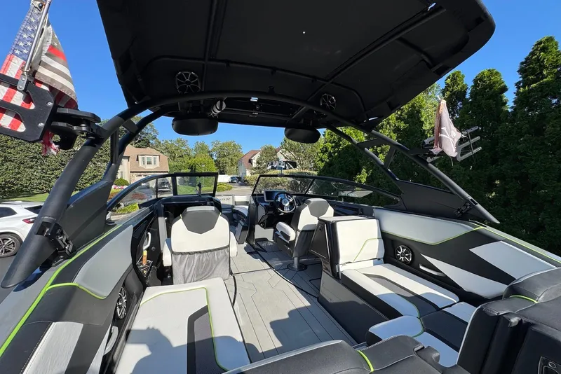 Slide: The Image of 2021 Yamaha Boats 255XD interior with modern seating and sleek design. - 19