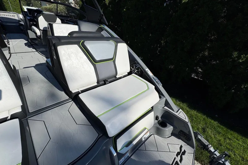Slide: The Image of 2021 Yamaha Boats 255XD interior with modern seating and sleek design. - 22