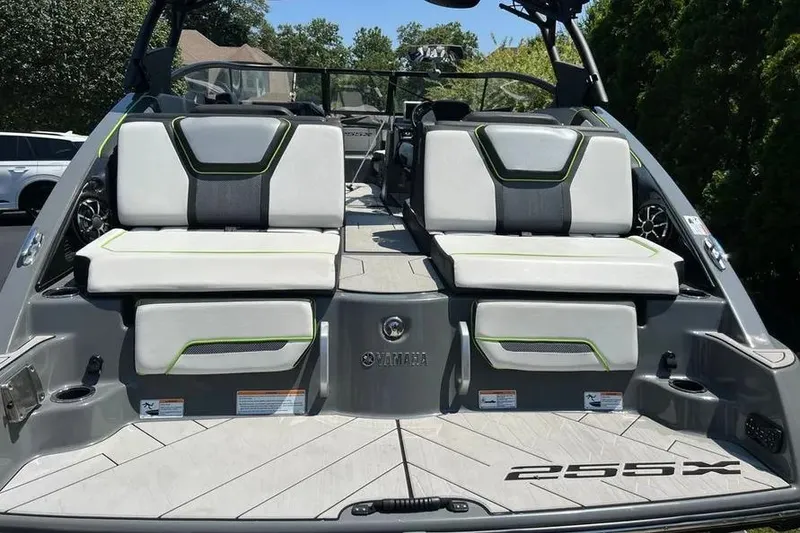 Slide: The Image of 2021 Yamaha Boats 255XD interior with cushioned seating and modern design. - 27