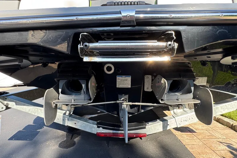 Slide: The Image of Rear view of a 2021 Yamaha Boats 255XD, showcasing dual jet propulsion system. - 7