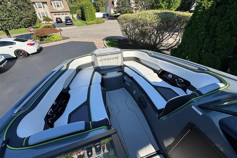 Slide: The Image of 2021 Yamaha Boats 255XD interior with sleek seating and modern design. - 8