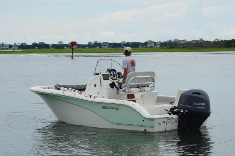 Slide: The Image of 2020 Sea Fox 186 Commander boat on calm water with Yamaha outboard motor. - 4