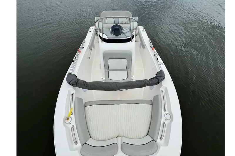 Slide: The Image of 2020 Sea Fox 186 Commander boat with spacious seating, viewed from above on water. - 6