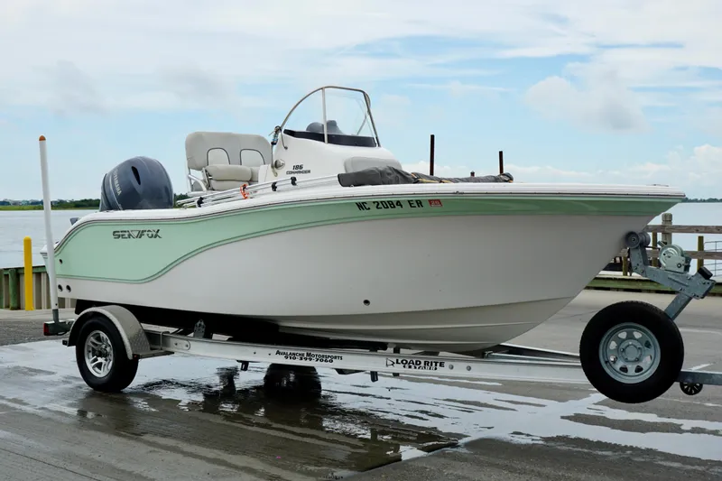 Slide: The Image of 2020 Sea Fox 186 Commander boat on trailer by waterfront. - 9