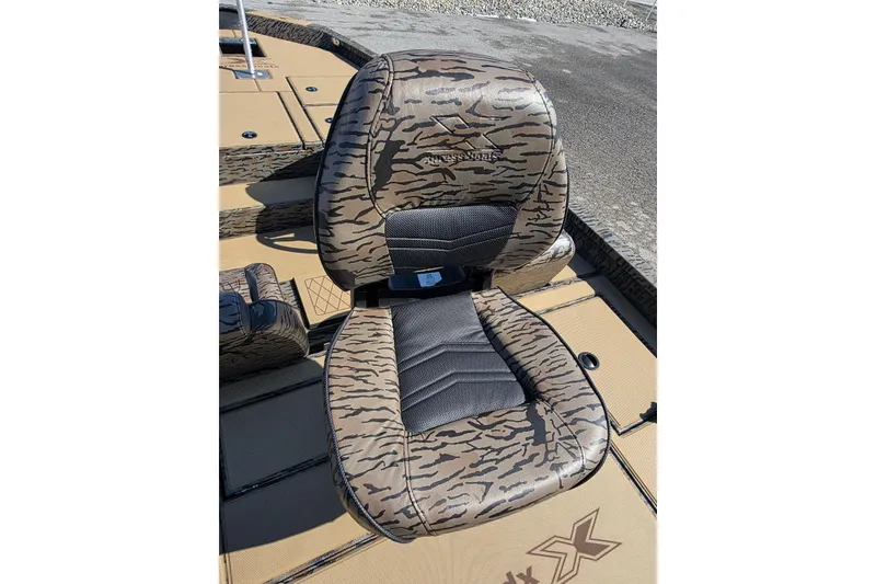 Slide: The Image of 2026 Xpress H18 Bass boat seat with camouflage pattern and sleek design. - 22