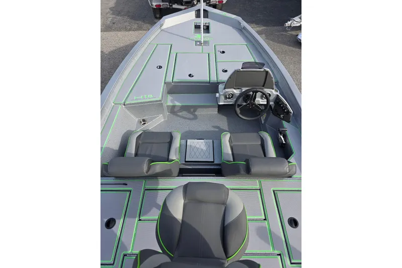 Slide: The Image of 2026 Xpress H18 Bass boat interior with modern seating and control panel. - 11