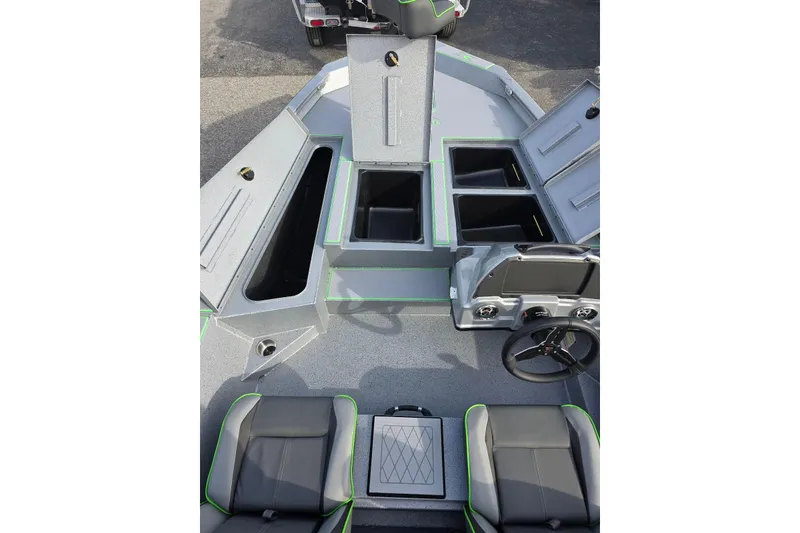 Slide: The Image of 2026 Xpress H18 Bass boat interior with storage compartments and seating. - 15