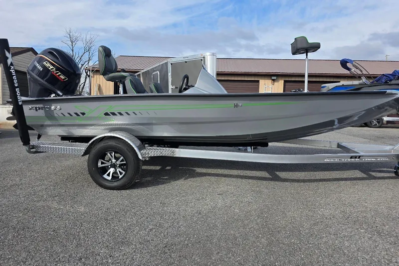 The Image of 2026 Xpress H18 Bass boat on trailer, featuring sleek design and Yamaha engine. - 5