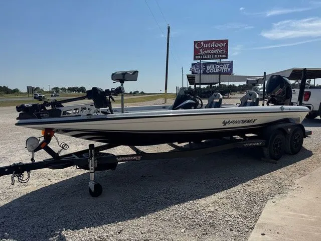 Slide: The Image of 2026 Phoenix 921 Elite X boat on trailer at outdoor dealership. - 4