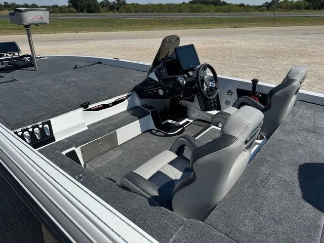 Slide: The Image of 2026 Phoenix 921 Elite X boat interior with dual seats and advanced dashboard controls. - 5