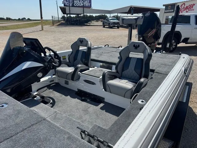 Slide: The Image of 2026 Phoenix 921 Elite X boat interior with dual seats and steering console. - 6