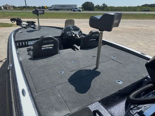 Slide: The Image of 2026 Phoenix 920 Elite X boat with spacious deck and modern seating. - 5