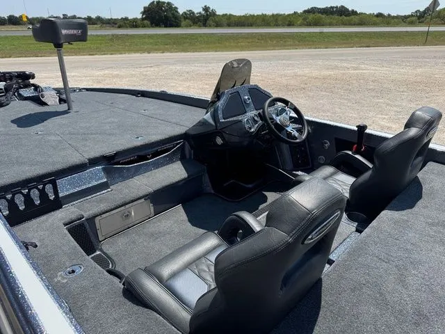 Slide: The Image of 2026 Phoenix 920 Elite X boat interior with dual seats and steering console. - 7