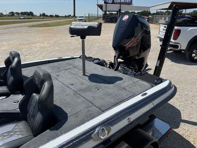 Slide: The Image of 2026 Phoenix 920 Elite X boat with sleek design and powerful outboard motor. - 8