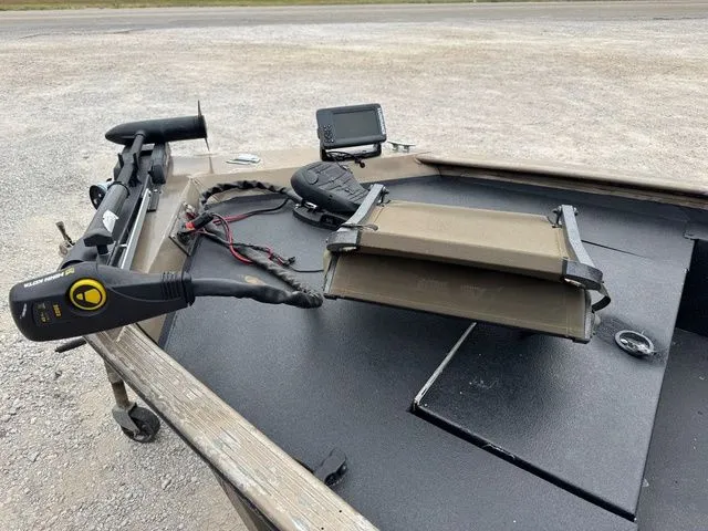 Slide: The Image of 2001 Xpress X51 boat deck with trolling motor and fish finder. - 4