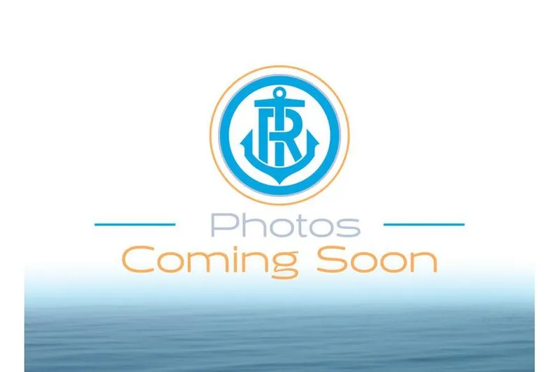 Slide: The Image of 2026 Bennington 22 SSB pontoon boat in showroom, featuring sleek design and modern amenities. - 1