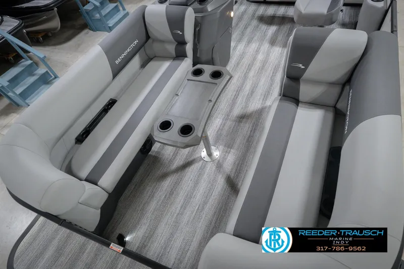 Slide: The Image of 2026 Bennington 22 SSB boat interior with gray seating and cup holders. - 12