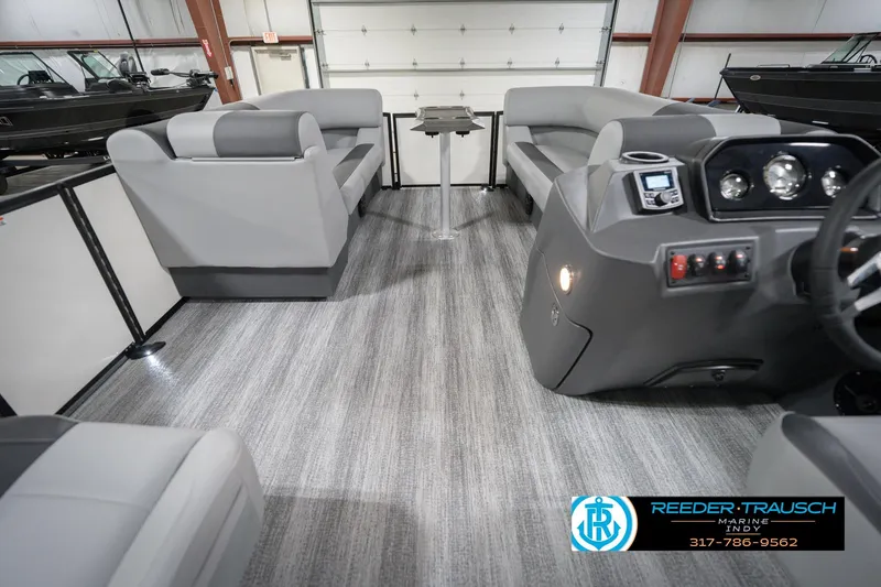 Slide: The Image of 2026 Bennington 22 SSB pontoon boat interior with modern seating and control panel. - 20
