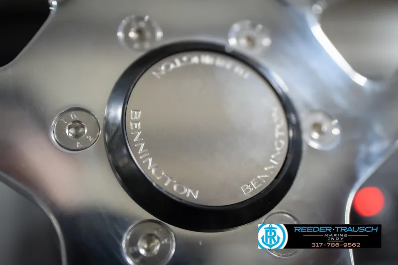 Slide: The Image of Close-up of 2026 Bennington 22 SSB steering wheel with Reeder-Trausch Marine logo. - 32