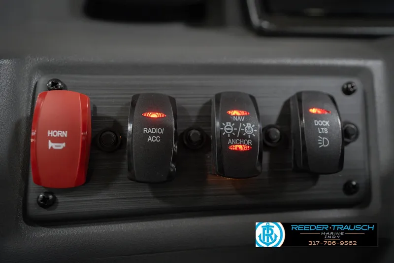 Slide: The Image of Control panel of 2026 Bennington 22 SSB boat with illuminated switches. - 33