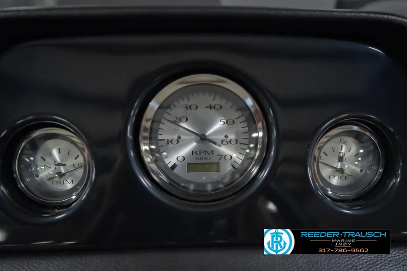 Slide: The Image of Dashboard gauges of 2026 Bennington 22 SSB boat, featuring RPM, trim, and fuel indicators. - 35