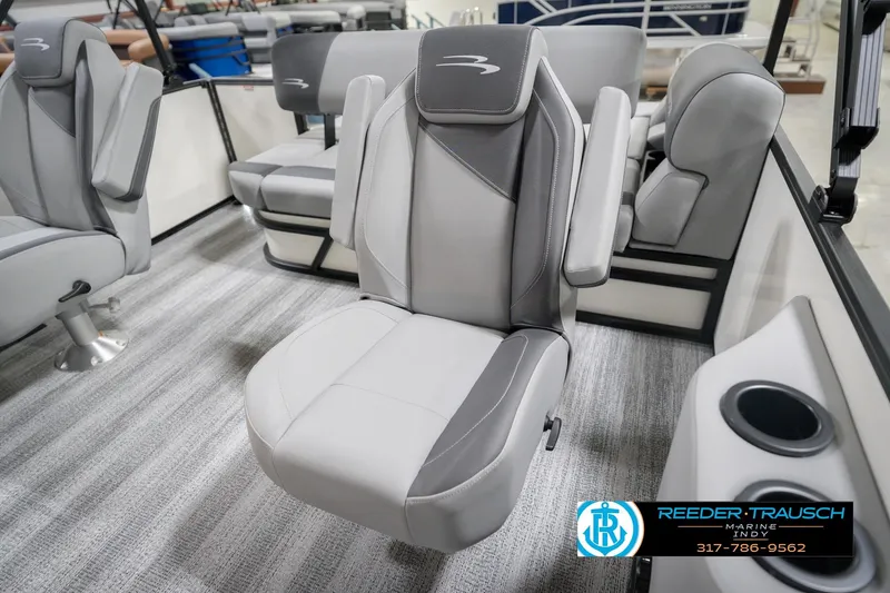 Slide: The Image of 2026 Bennington 22 SSB boat interior with luxurious gray seating and armrests. - 41