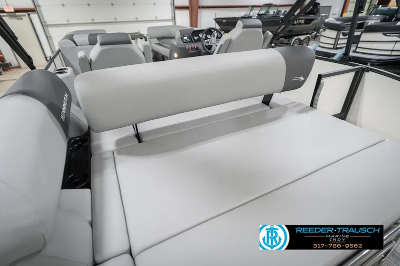 Slide: The Image of 2026 Bennington 22 SSB boat interior with gray seating and steering console. - 44
