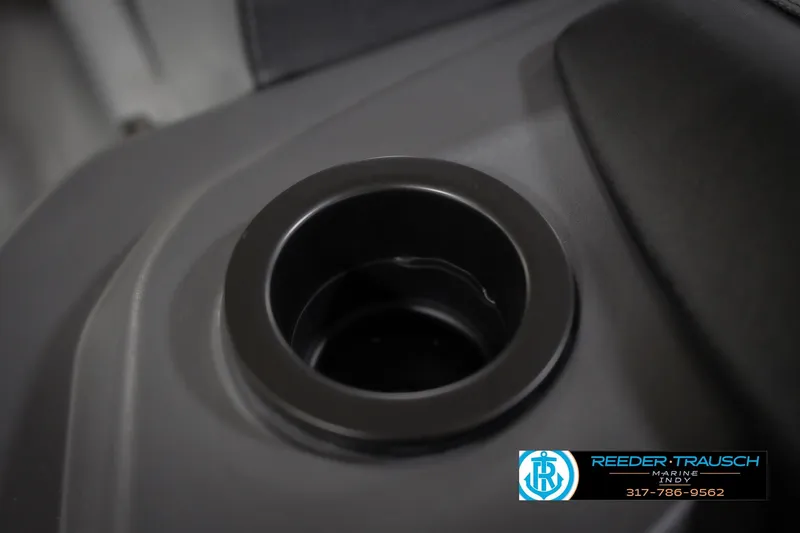 Slide: The Image of Close-up of a cup holder in a 2026 Bennington 22 SSB boat interior. - 46