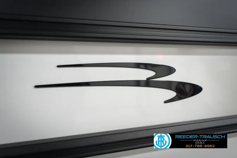 Slide: The Image of 2026 Bennington 22 SSB logo on boat with Reeder-Trausch Marine contact details. - 48