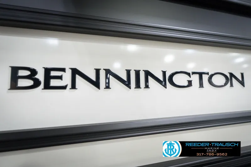 Slide: The Image of Bennington 22 SSB 2026 model logo on boat exterior, Reeder-Trausch Marine branding visible. - 49