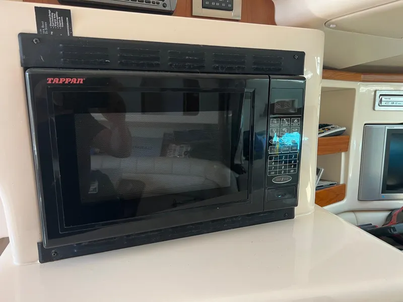 Slide: The Image of Tappan microwave in 2006 Grady-White Express 360 boat interior. - 17