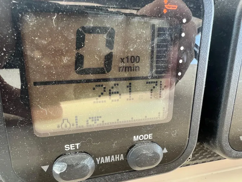 Slide: The Image of Close-up of a Yamaha boat display panel on a 2006 Grady-White Express 360. - 21