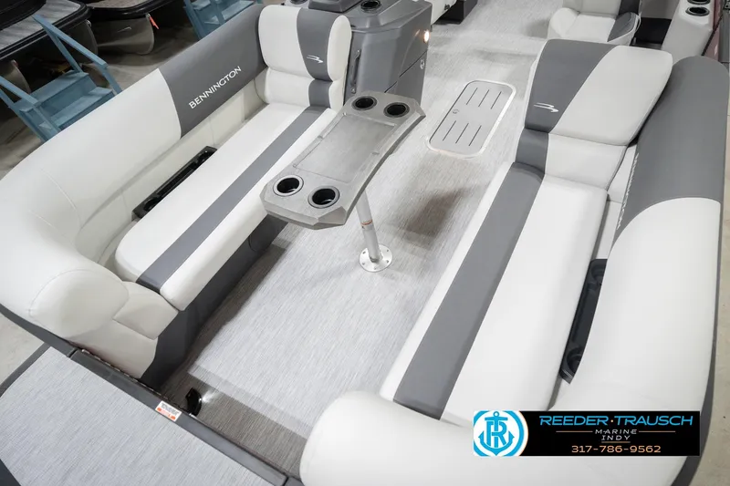 Slide: The Image of 2026 Bennington 22 SSR pontoon boat interior with gray seating and cup holders. - 10