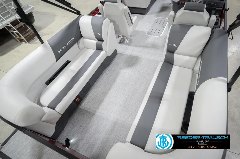Slide: The Image of 2026 Bennington 22 SSR boat interior with gray and white seating, spacious layout. - 12