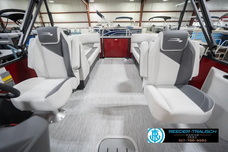 Slide: The Image of 2026 Bennington 22 SSR pontoon boat interior with modern seating and spacious layout. - 15
