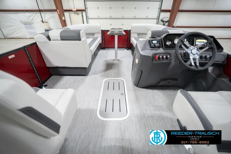 Slide: The Image of Interior of 2026 Bennington 22 SSR pontoon boat with modern seating and steering console. - 18
