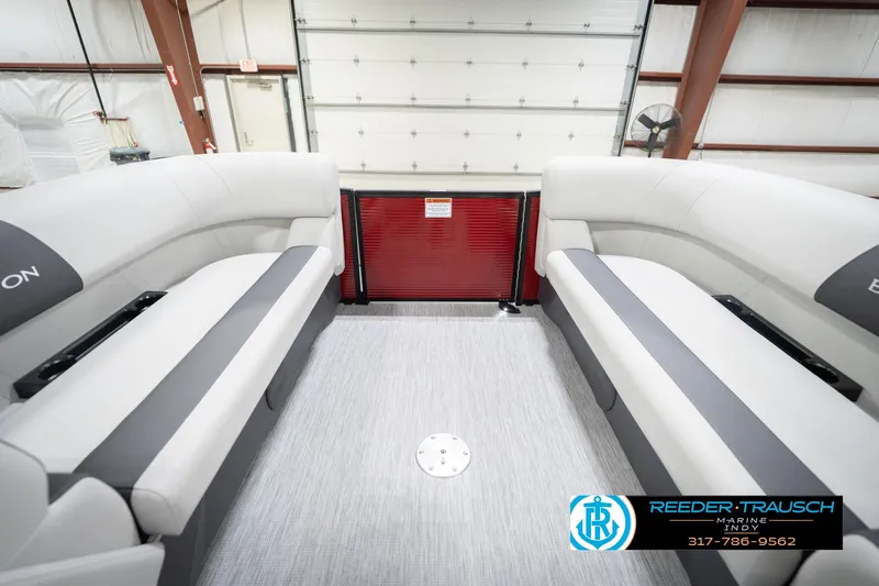 Slide: The Image of 2026 Bennington 22 SSR pontoon boat interior with gray seating and modern design. - 20