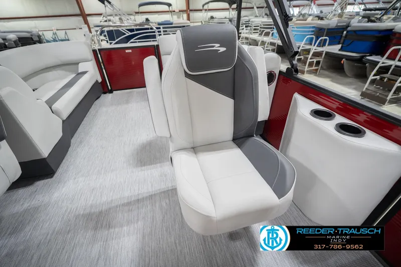 Slide: The Image of 2026 Bennington 22 SSR boat interior with stylish seating and cup holders. - 24