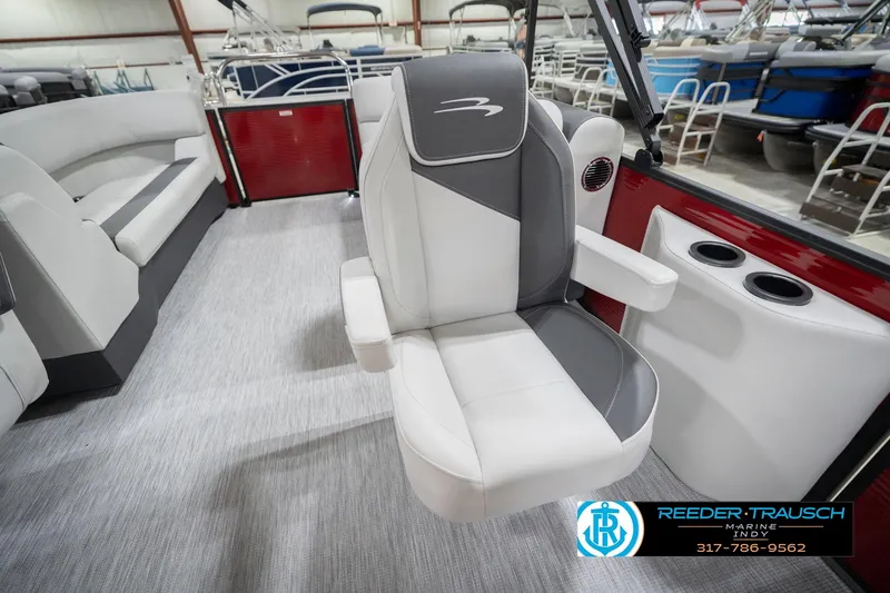 Slide: The Image of 2026 Bennington 22 SSR boat interior with plush seating and modern design. - 25