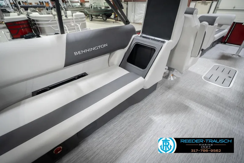 Slide: The Image of Interior of 2026 Bennington 22 SSR pontoon boat with seating and storage compartment. - 27